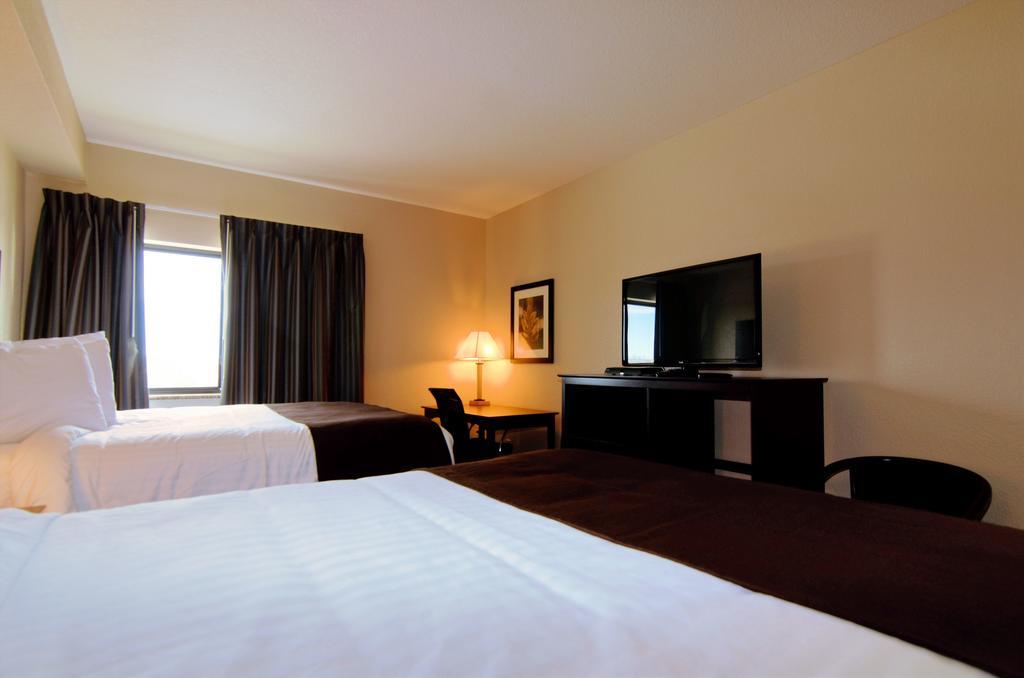 Cobblestone Inn & Suites - Denison | Oak Ridge Habitación foto