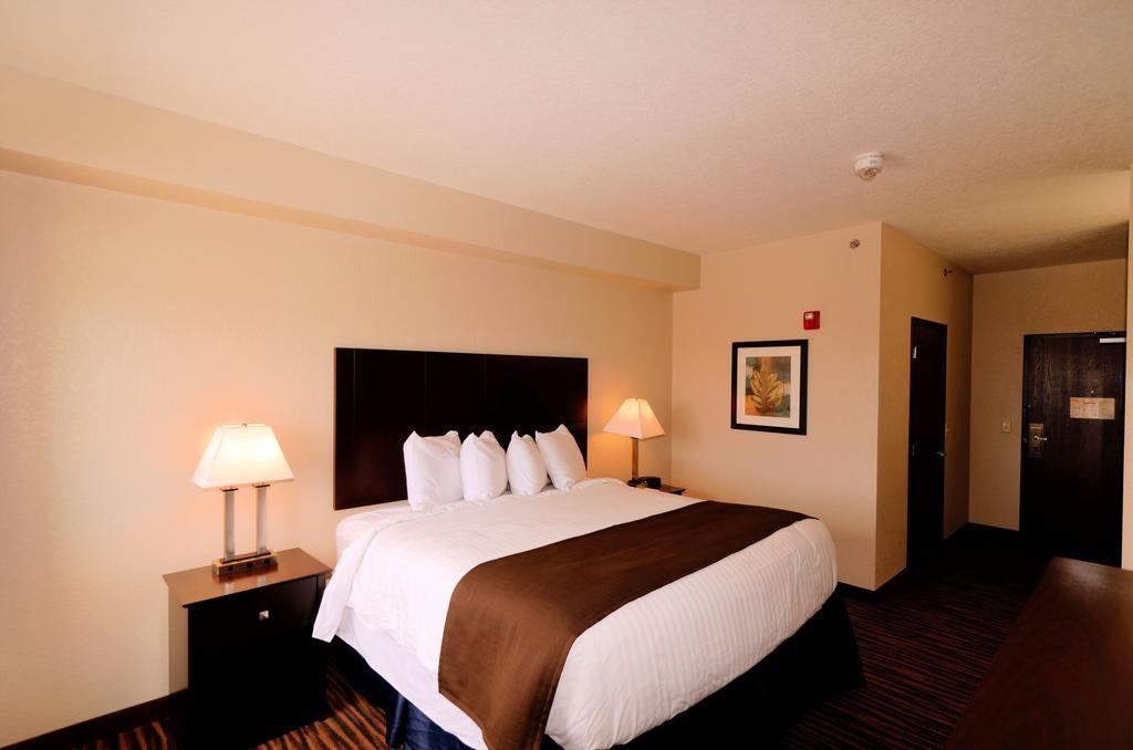 Cobblestone Inn & Suites - Denison | Oak Ridge Habitación foto
